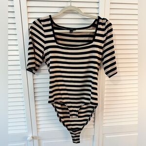 J Crew Black and tan striped bodysuit.  Great condition.  Size medium.